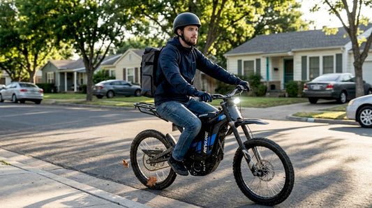 Rider commuting on Surron electric bike in city neighborhood